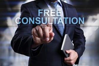 Auto Insurance Adjuster Tricks: What They Do Not Want You to Know 3 Businessman is pressing on virtual screen and selecting Free consultation for help dealing with an auto insurance adjuster.