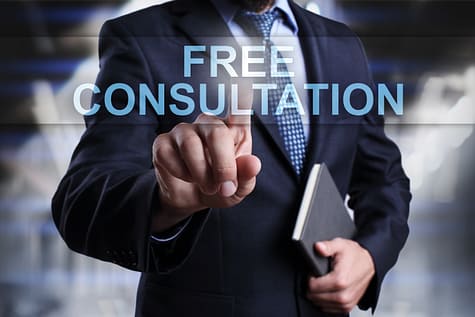 Do I Need a Car Accident Lawyer for a Wreck in Texas? 4 Businessman is pressing on virtual screen and selecting Free consultation.