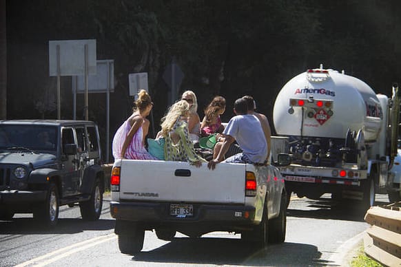 Is It Legal to Ride in the Bed of a Pickup Truck? A Complete 50 State Guide 2 People riding in the bed of a pickup truck that is in motion. Is It Legal to Ride in the Bed of a Pickup Truck? A Complete 50 State Guide