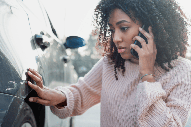 woman calling for a lawyer for a farmers insurance claim